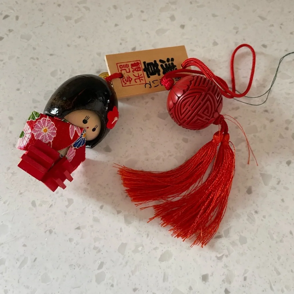 Japanese Kokeshi Doll and Red Carved Shou Orb Ornaments